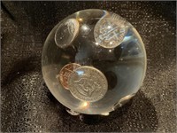 A Paperweight Containing American Coins