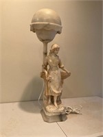A Figural Table Lamp