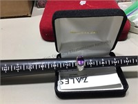 Amethyst & Diamond ring. 14k mounting weighing .5
