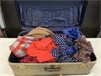 Lady Fam-Line's Suitcase and Retro Clothing