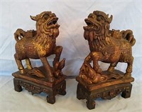 Pair of hand carved teak wood foo dogs