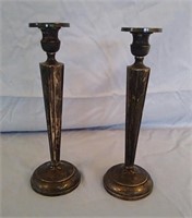 Pair of sterling weighted candle sticks