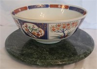 Andrea by sadek bowl with a marble stand