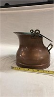 Copper pot with brass handle