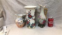 Assorted hand painted pitchers