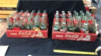 2 old cardboard Coca Cola crates full of bottles