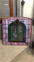 Stained glass window 26 x 27 has a few small