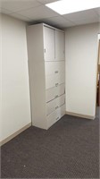 Large file cabinet five large doors on bottom two