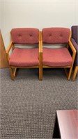 Pair of red office chairs