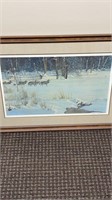 A piece of signed art I Robert Bateman wolves in