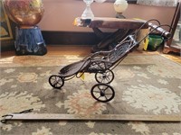 Wicker Stroller Doll Display