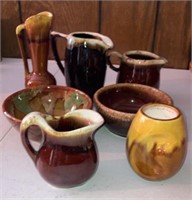 Assorted glazed pitchers and bowls
