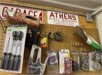 selection of garage items and metal signs