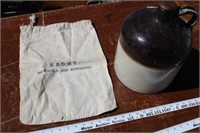 Stoneware jug, SDDOT material bag
