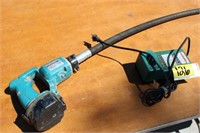 Makita concrete vibrator with battery and charger