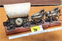 Horse drawn covered wagon clock