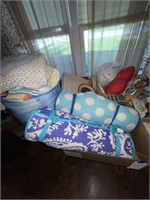 Miscellaneous linens with basket and hangers