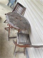 Wooden patio table with two chairs