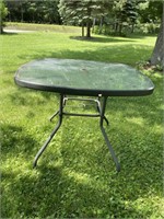Glass top patio table