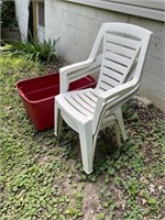 Plastic lawn chairs and red tote no lid