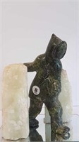 CARVED INUIT FIGURE WITH GEODES