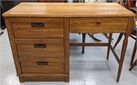 Wood desk w/ 3 drawers. 42" L x 18" W x 30" H.
