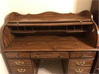 53X44 INCH ROLL TOP DESK.  COMES WITH OFFICE
