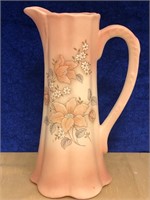 VERY NICE 10 INCH CERAMIC PITCHER.  IT IS MARKED