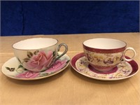PAIR OF BONE CHINA TEACUP AND SAUCER SETS.