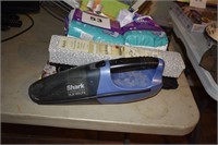 SHARK CORDLESS VAC/ FLOPPY DISKS/ ADULT DIAPERS