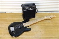 Small electric guitar and amp
