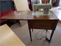 KENMORE SEWING MACHINE W / CABINET