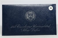 1974-s UNC Eisenhower Silver Dollar in Blue Pack