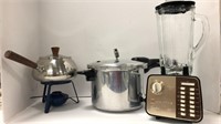 (1) Presto pressure cooker, (1) fondue pot, (1)