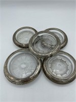 Set of five Sterling silver and glass coasters.