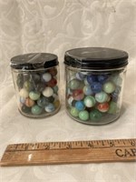 Two small jars of Marbles