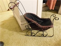 small toy wicker sleigh