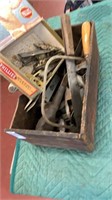 Old wooden box of hardware and old tools