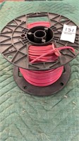Red 12 gauge wire on spool