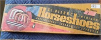 Horseshoe set with stakes