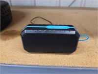 Waterproof Bluetooth speaker with charging cord