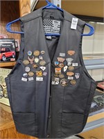 Leather vest size 40 with pins approx 38 pins
