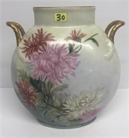 Two handled pillow vase w/ flowers