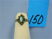 Nine karat ladies rose gold opal ring.