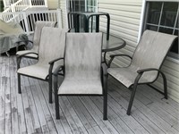 Patio set includes glass top table, four chairs,