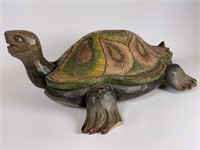 Large carved wooden turtle