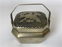 Early Asian metal hand warmer