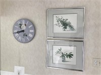Framed prints and a decorative clock
