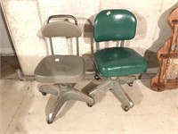 Two industrial office chairs with metal bases