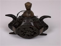 String lid Asian carved wood vessel